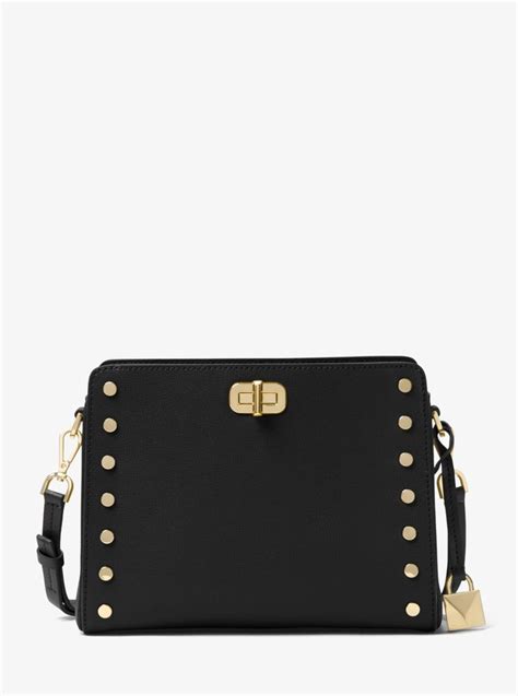 michael kors sylvie studded leather messenger|Michael Kors Sylvie Stud Medium Messenger Cement.